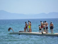 Ayvalık yeni normalleşme sürecinde deniz ve plaj sezonunu açtı