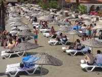 Plajlarda ‘Ateş ölçerli' tatil