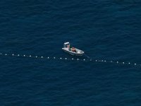 Çin, Güney Çin Denizi'nde ihtilaflı sığlığa yeniden yüzen bariyer yerleştirdi