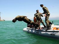 Elleri, ayakları ve gözleri bağlı suya atıldılar